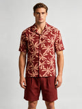 Men's Short Sleeve Cuban Collar Button-Up Shirt with All-Over Tropical Palm Pattern - Terracotta Red